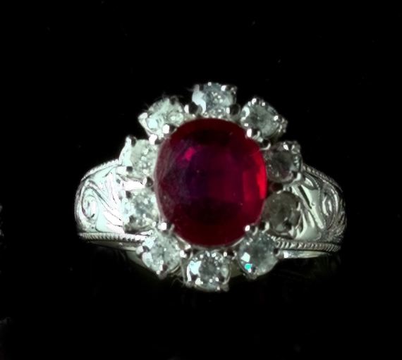 Appraisal: Fourteen-Karat White Gold Ruby and Diamond Dinner Ring featuring a