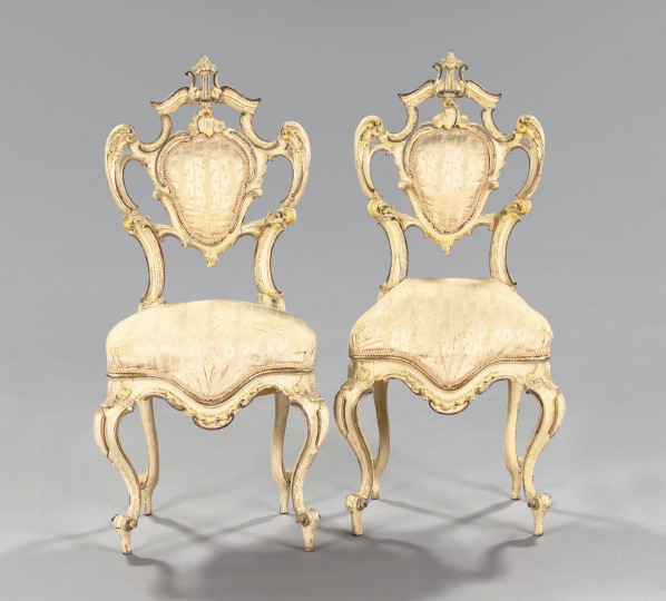 Appraisal: Exuberant Pair of Italian Polychromed and Parcel-Gilt Salon Chairs late