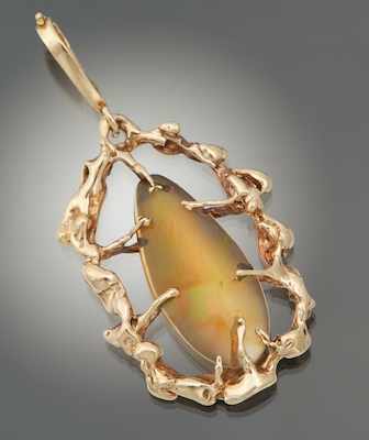 Appraisal: A Ladies' Opal and Gold Pendant k yellow gold pendant