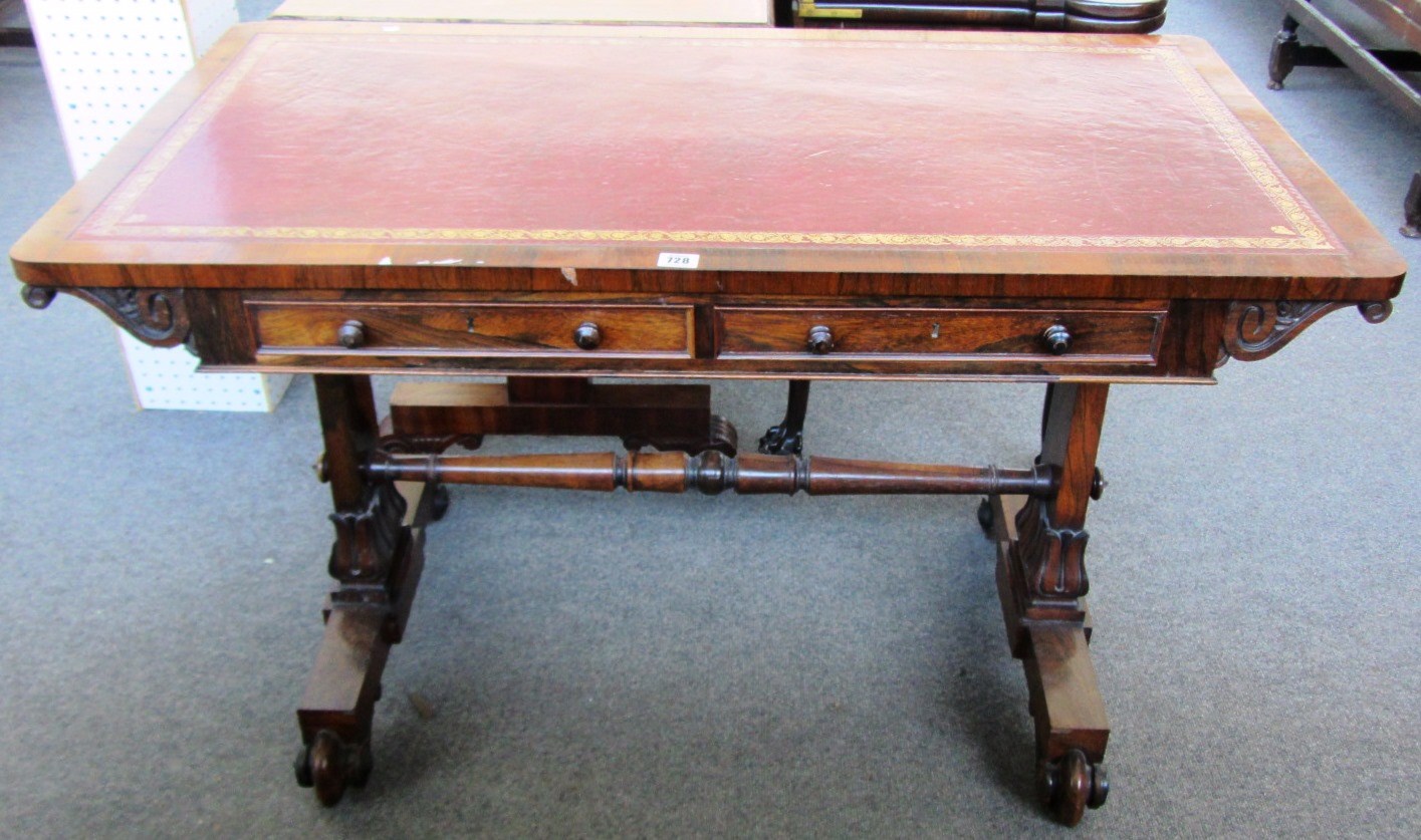 Appraisal: A William IV rosewood writing table with pair of frieze