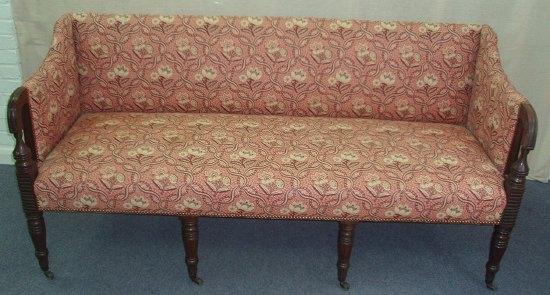 Appraisal: A Regency mahogany framed settee the upholstered back and seat