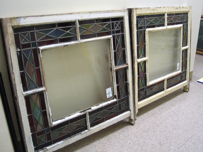 Appraisal: PAIR STAINED AND LEADED GLASS WINDOWS having vivid red glass