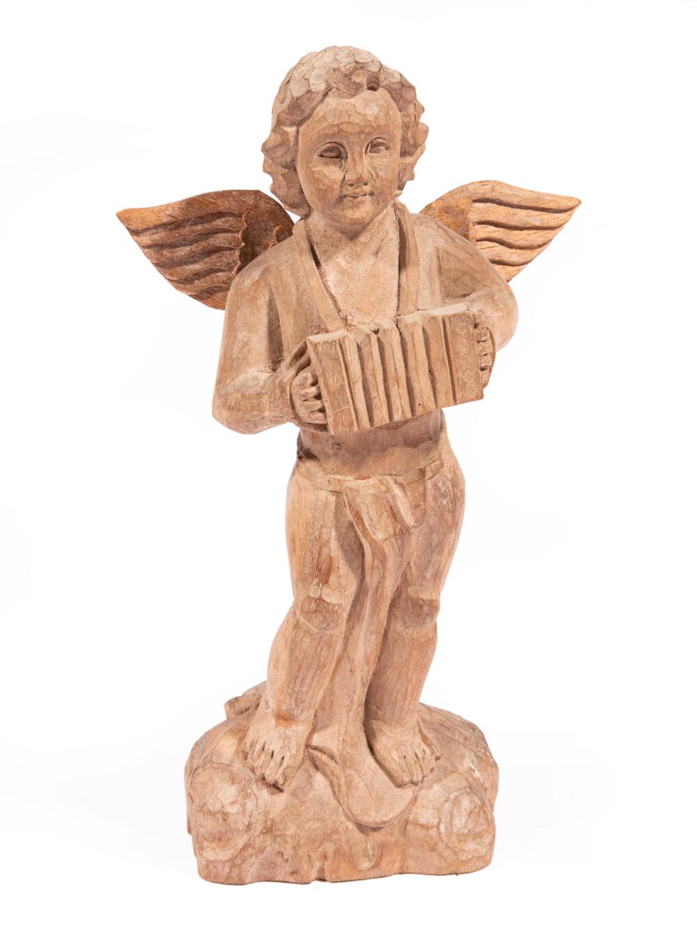 Appraisal: Carved Wood Figure of an Angel Playing the Accordion cloud-form