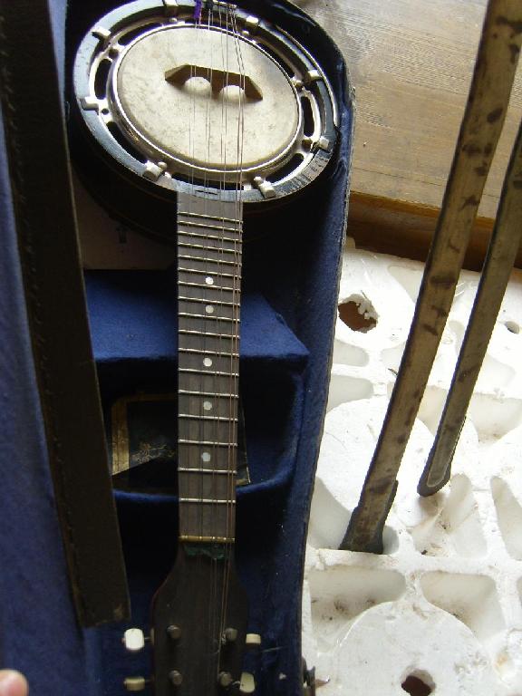 Appraisal: A cased -string banjolele by John Grey Sons