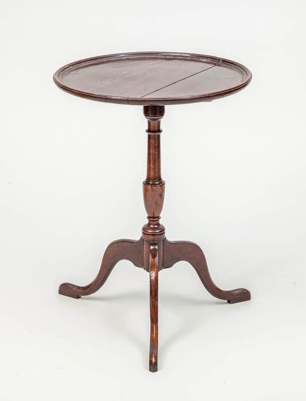 Appraisal: GEORGE III STYLE MAHOGANY TILT-TOP TRIPOD TABLE With dished top