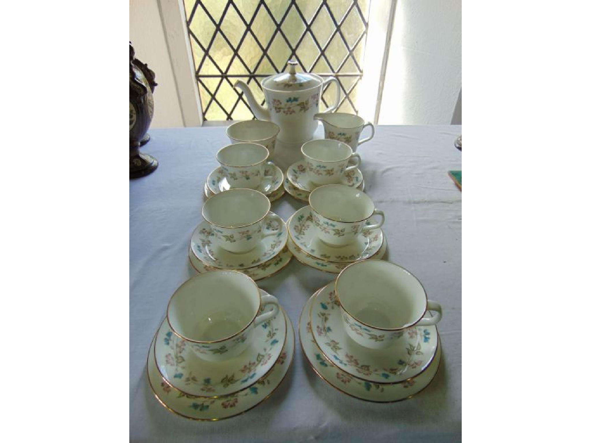 Appraisal: A collection of Minton's Fragrance pattern tea wares with blue