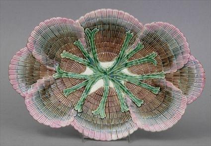 Appraisal: ETRUSCAN MAJOLICA SHELL CENTERPIECE Modeled with pink green and brown