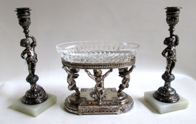 Appraisal: PAIRPOINT SILVERPLATE CENTERPIECE BOWL AND CANDLESTICKS three pieces the pedestal