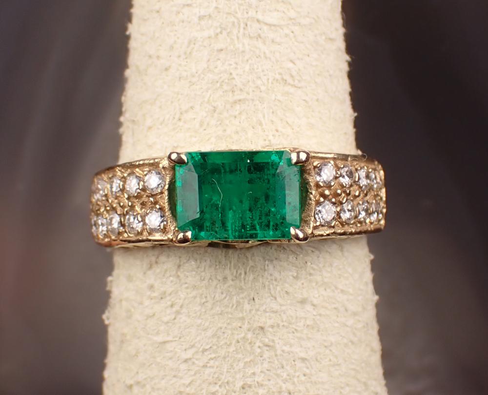 Appraisal: EMERALD DIAMOND AND FOURTEEN KARAT GOLD RING The yellow gold