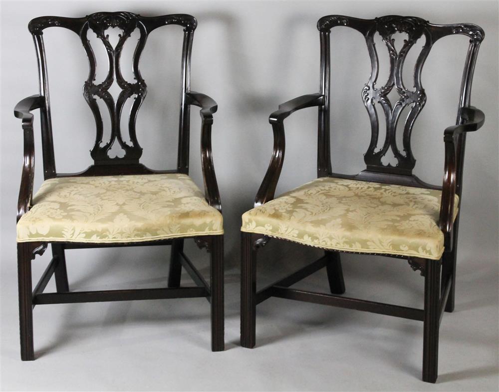 Appraisal: PAIR OF ENGLISH CHIPPENDALE STYLE MAHOGANY ARM CHAIRS carved shaped