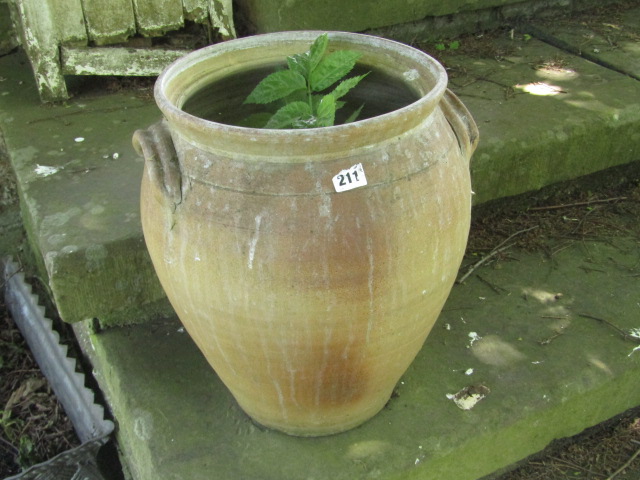 Appraisal: A quantity of terracotta and glazed garden planters