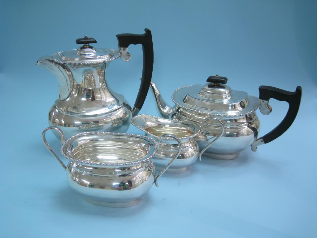 Appraisal: A George VI four piece Tea Service of boat shape