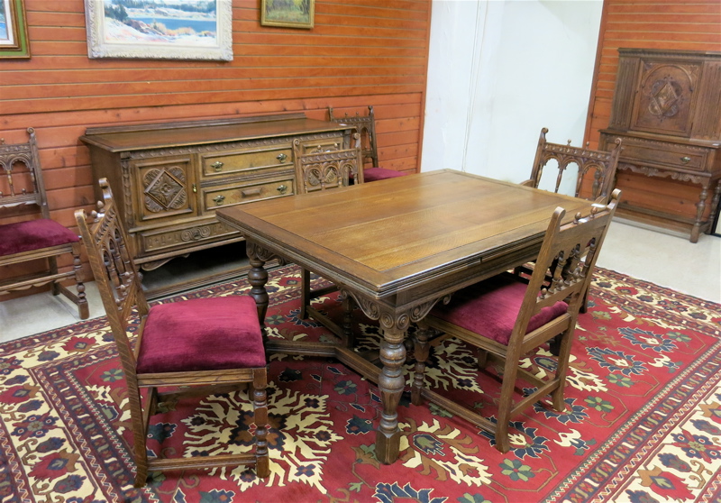 Appraisal: NINE-PIECE CARVED OAK DINING FURNITURE SET Berkey Gay Furniture Co