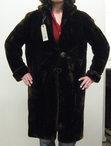 Appraisal: A FAUX FUR LADY'S COAT resembling mole full length satin