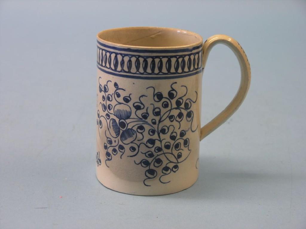 Appraisal: A late th century pearlware mug cylindrical-shape painted with flowers