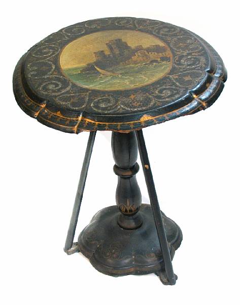 Appraisal: A Victorian papier mache table the top decorated with a