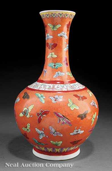 Appraisal: A Chinese Famille Rose Coral-Ground Porcelain ' Butterfly' Bottle Vase