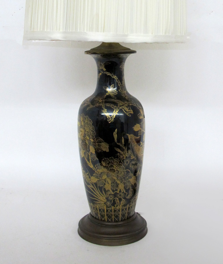 Appraisal: CHINESE GILT DECORATED BLACK PORCELAIN LAMP Baluster form porcelain body