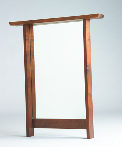 Appraisal: GEORGE NAKASHIMA Walnut free-standing rectangular mirror with overhanging and beveled