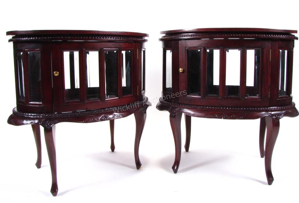 Appraisal: A pair of glass and mahogany vitrine tables with lift-off