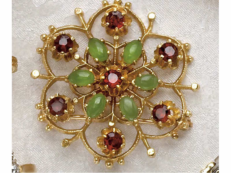 Appraisal: GARNET AND JADE BROOCH Yellow gold brooch with six oval