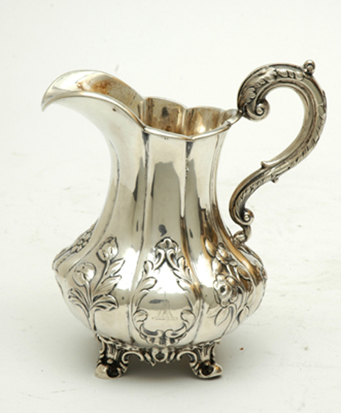 Appraisal: A VICTORIAN STERLING SILVER CREAMER Maker's mark Hyam Hyam London