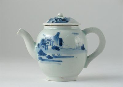 Appraisal: A small Japanese blue and white teapot and cover painted