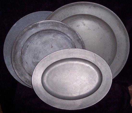 Appraisal: A large pewter charger cm diameter two further chargers and