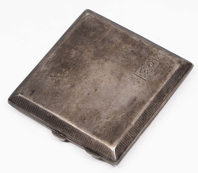 Appraisal: A silver cigarette caseof square cut form with engine turned