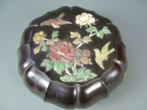 Appraisal: A Zotan box of circular form with foliate rim the