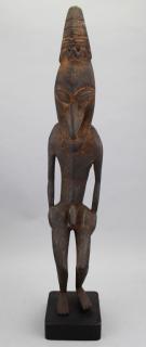 Appraisal: Carved Papau New Guinea Ancestral Figure Carved Papau New Guinea