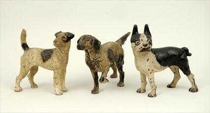 Appraisal: Three Painted Cast-Iron Dog Figures to x to in