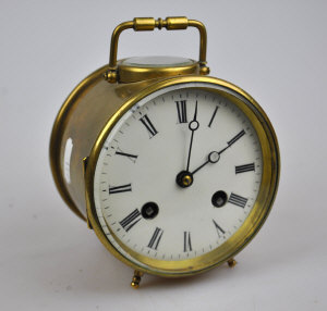 Appraisal: A late th century brass cased drum clock the eight-day