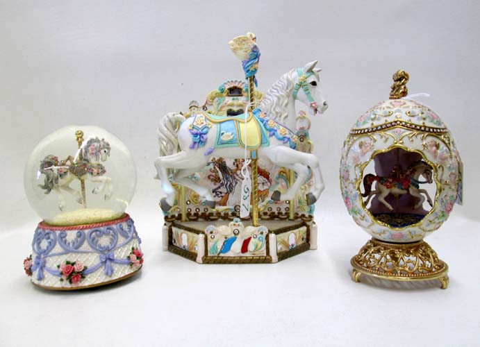 Appraisal: THREE CAROUSEL HORSE DECORATIONS French Musical Carousel with Swan Jumper