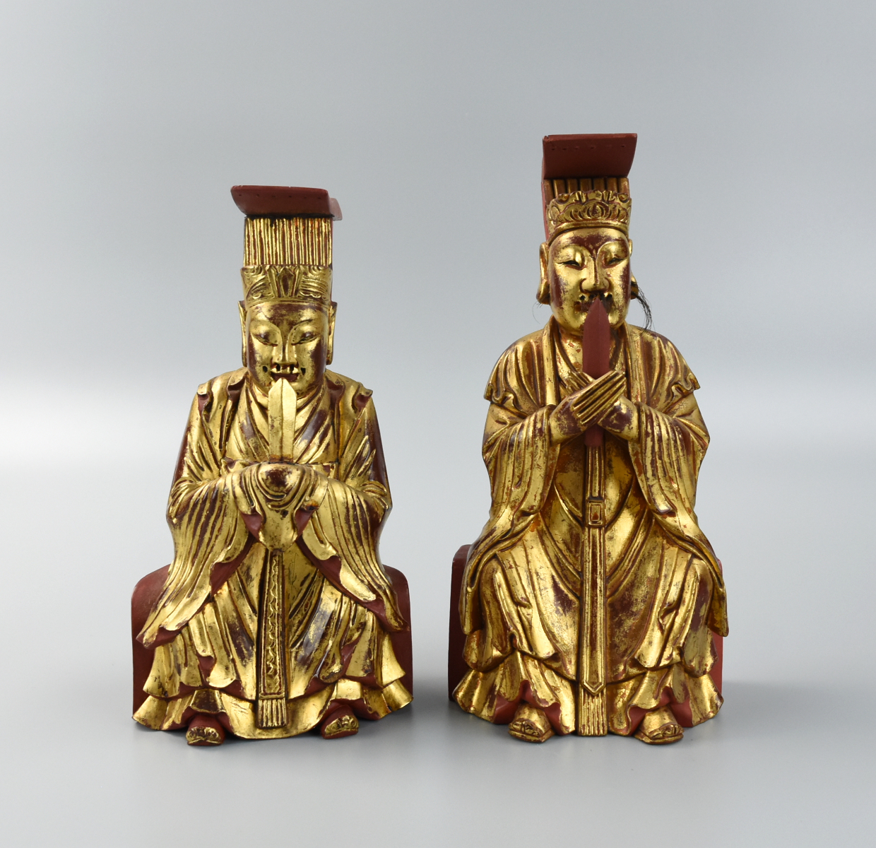 Appraisal: PAIR OF CHINESE GILT LACQUER WOOD FIGURE Pair of Deity