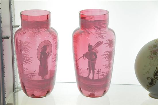 Appraisal: PAIR OF GLASS VASES Cranberry glass vases with Mary Gregory