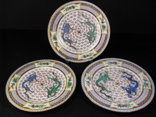 Appraisal: Three th century Chinese hand painted porcelain plates with four