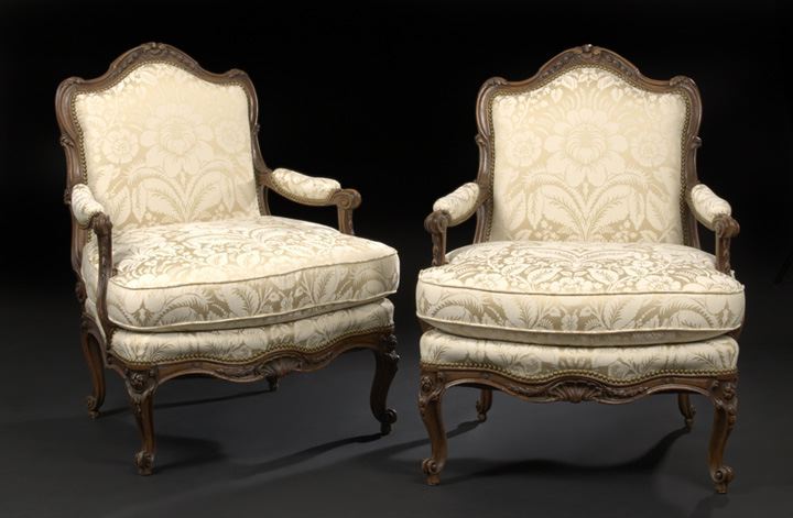 Appraisal: Pair of Louis XV-Style Fruitwood Fauteuils late th century each