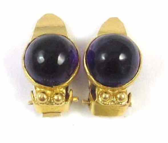 Appraisal: PAIR OF AMETHYST CABOCHON EARRINGS each k yellow gold clip