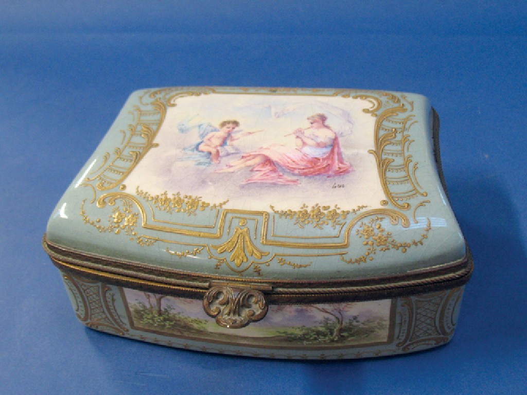 Appraisal: A CONTINENTAL PORCELAIN BOX AND COVER of cartouche shape the