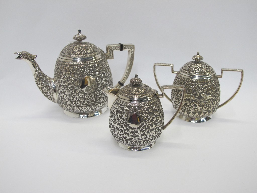 Appraisal: A three piece bachelor's silver plated tea service the teapot