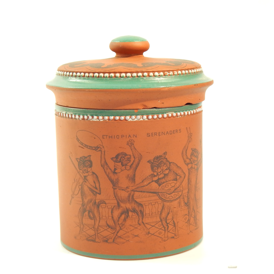 Appraisal: A late thC terracotta tobacco jar and cover printed in