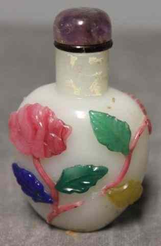 Appraisal: Asian Hardstone Snuff Bottle with Multi ColoredRelief Carved Leaves and