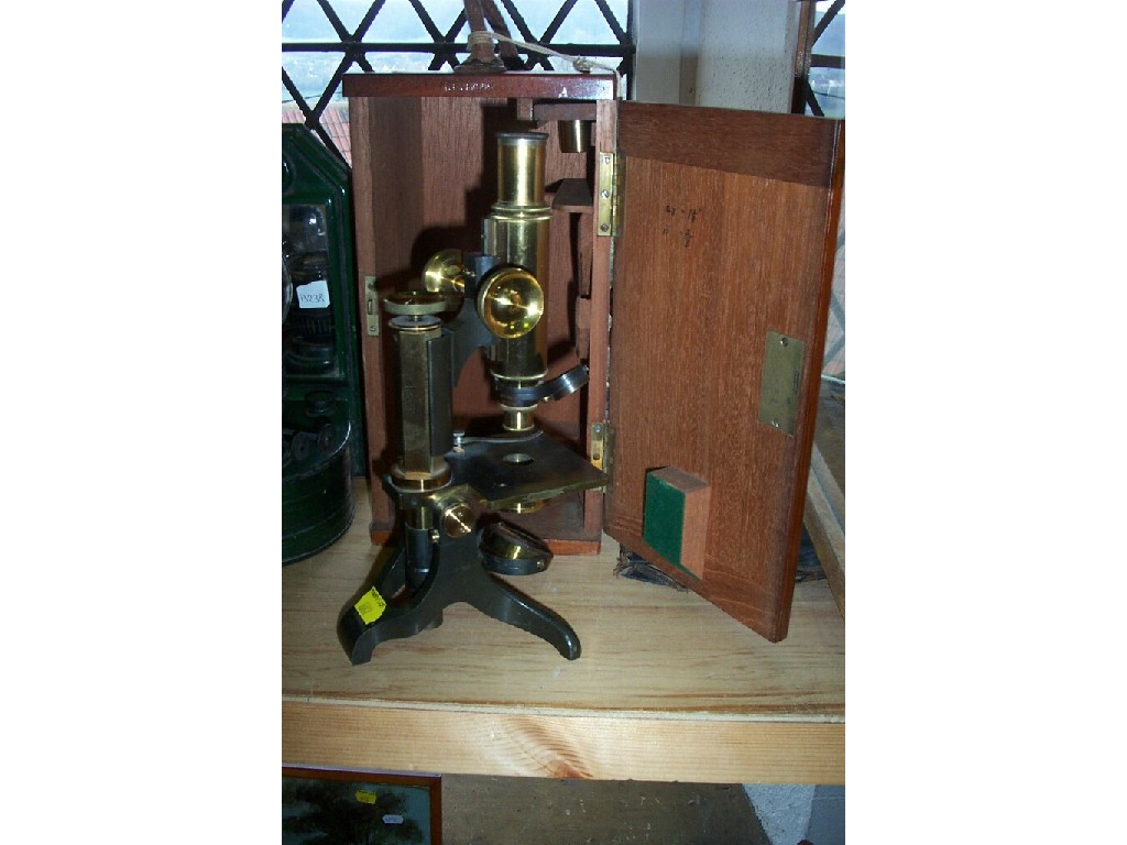 Appraisal: A mahogany cased microscope inscribed Baker of High Holborn London