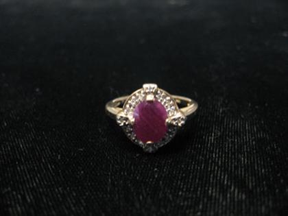 Appraisal: Lady's karat yellow gold ruby and diamond ring Set with