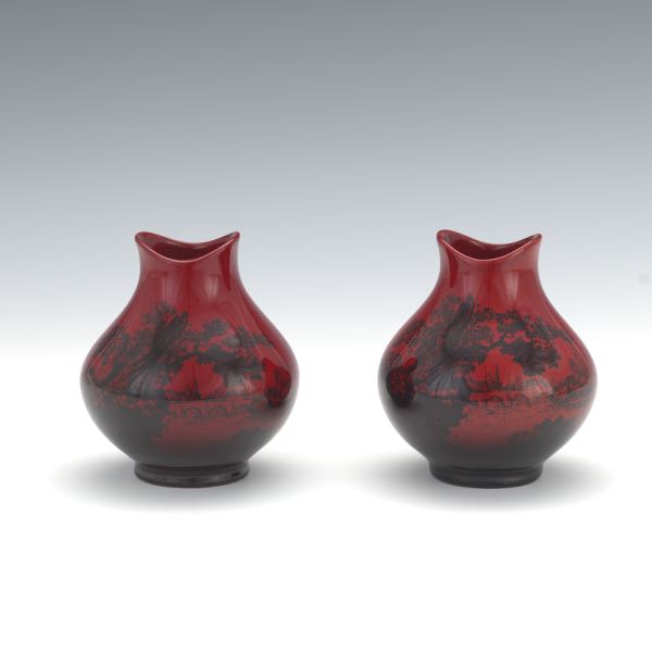 Appraisal: PAIR OF ROYAL DOULTON FLAMBE VASES Pair of short flambe