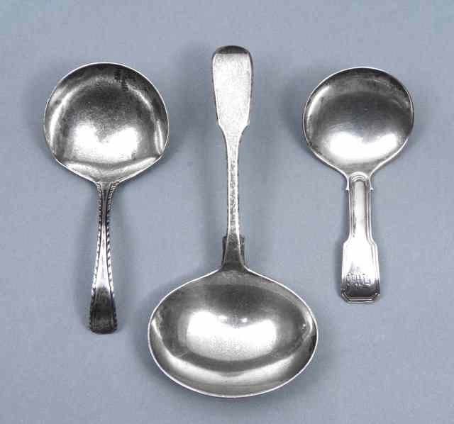 Appraisal: A GEORGE III SILVER CADDY SPOON with circular bowl and