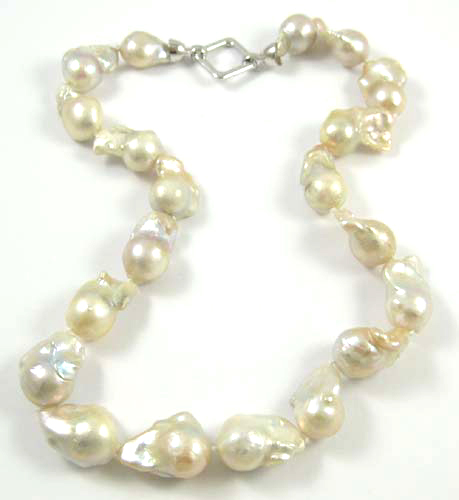 Appraisal: BAROQUE PEARL AND SILVER NECKLACE strung with baroque white pearls