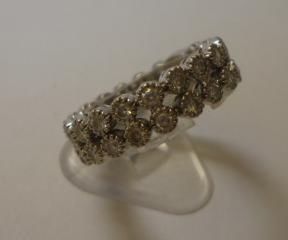 Appraisal: A DIAMOND FLEXIBLE ETERNITY RING the round cut diamonds milligrain