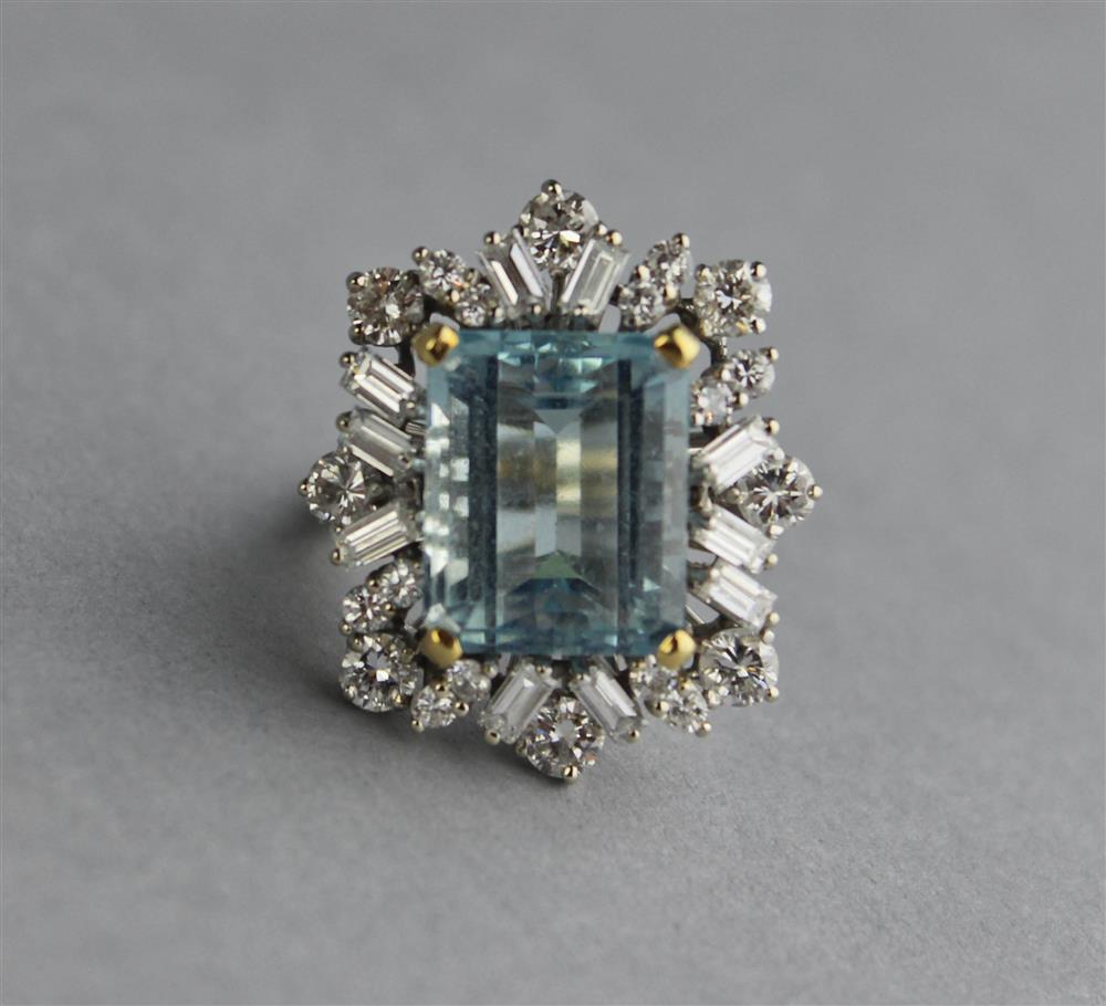 Appraisal: LADY'S DIAMOND AND AQUAMARINE COCKTAIL RING the central emerald cut